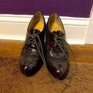 Brown Oxford-style heeled booties